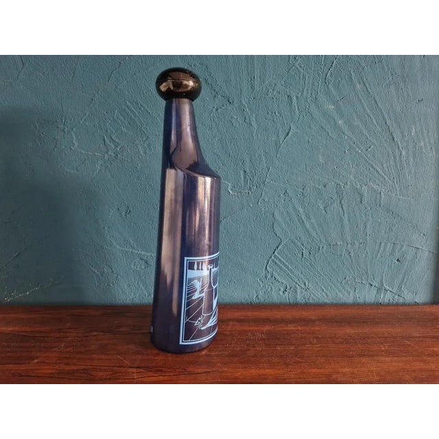 Rosso Antico Likör bottle No.3 from the 1970s. Original cap available. This Bottle is Empty. This piece has an attribution...