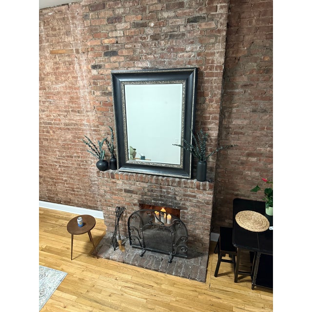 Beautiful oversized mirror with a deep black frame and antique silver detailing. Solid, heavy, high-quality. Dimensions:...