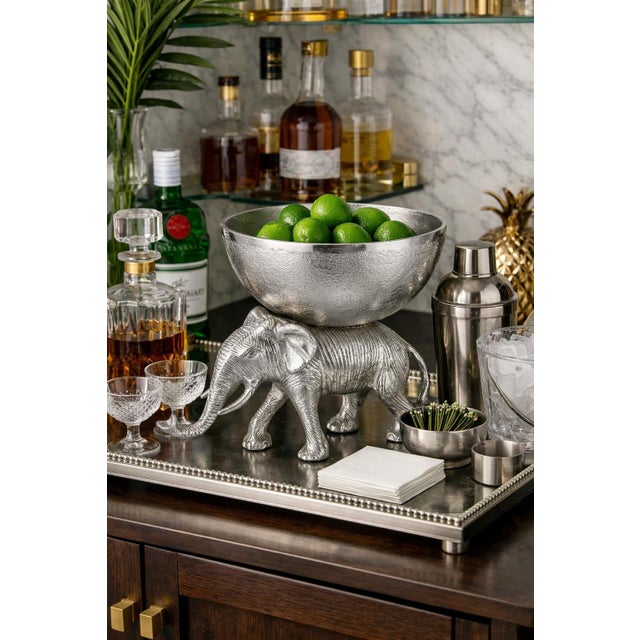 This striking Ponderous Pachyderm is definitely a statement piece! For your consideration, this Generously Sized...
