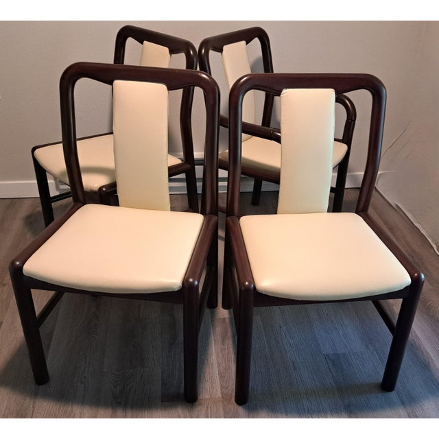 An authentic set of four Danish Modern dining chairs by Boltinge Stolefabrik A/S, Ringe, Denmark, including one captain's...