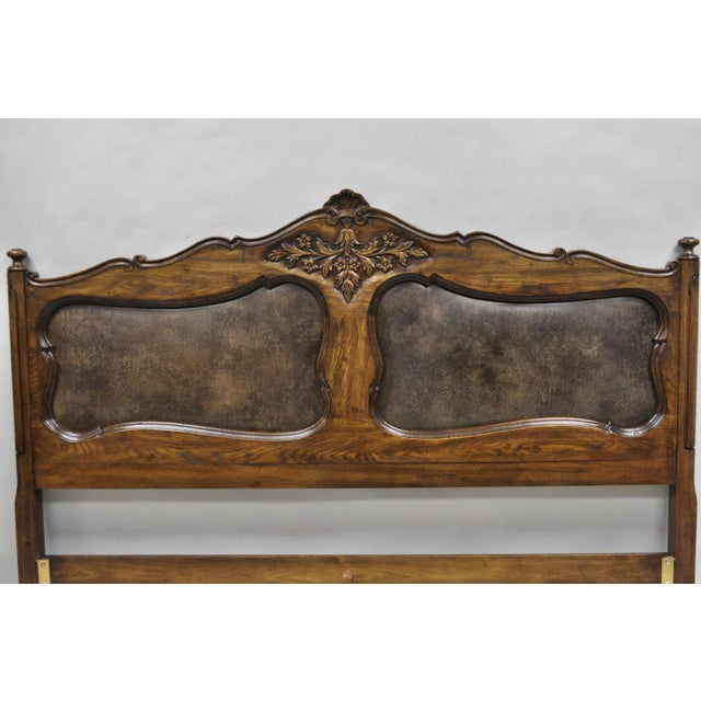Vintage French Country Provincial Oak Wood King Size Bed Headboard with Brown Vinyl Upholstered Panels. Circa Late 20th...