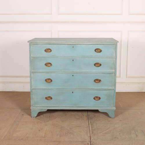 Late 18th century English four drawer pine and oak chest of drawers with later mottled blue paint. 1790. This piece is...