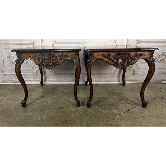 A truly exquisite and highly sculptural pair of French Louis XV-style side tables, circa early to mid-20th century,...