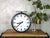 Step into history with this rare vintage double-faced railway clock by telenorma, a genuine timepiece from the 1950s...