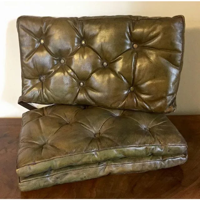 Set of three Edwardian button tufted leather Chesterfield rectangular cushions. Color is a rich brown green. Two of the...