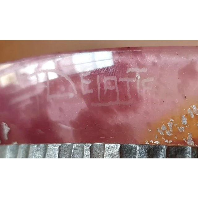 Impressive cut in ribbed ribbed pink and yellow fledes with inter -lap powder and gold mlazes. Hammered wrought iron...