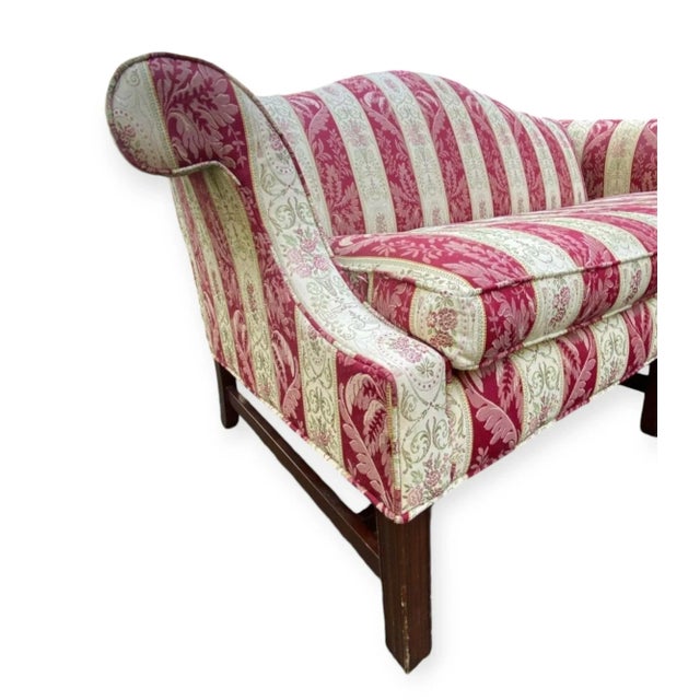 A colorful Ethan Allen red and white striped floral camelback sofa. Breezy! A nice addition to a country cottage or a...