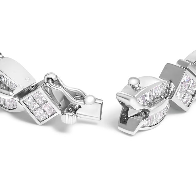 Immerse yourself in the luxurious embrace of this meticulously crafted 14K white gold bracelet, plated with rhodium for an...