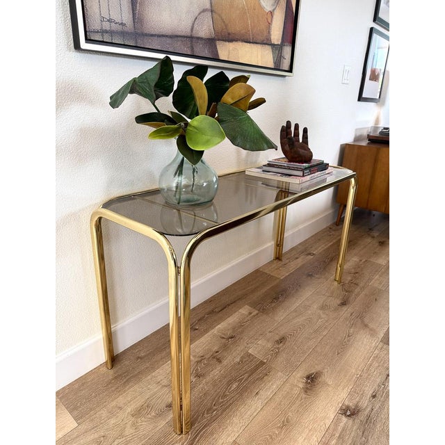 1970s Hollywood Regency Brass Console Table With Smoked Glass Top and Waterfall Edges For Sale - Image 5 of 9