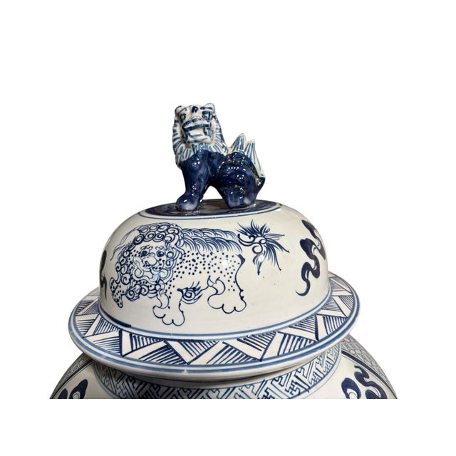 Impressive vintage Chinese porcelain blue and white lidded palace urn, handcrafted in a classic form. This substantial...