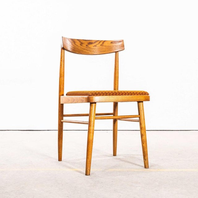 1950’s Mid Century Oak And Ash Upholstered Dining Chairs. Sourced from a retreat in the Czech Republic this is an...