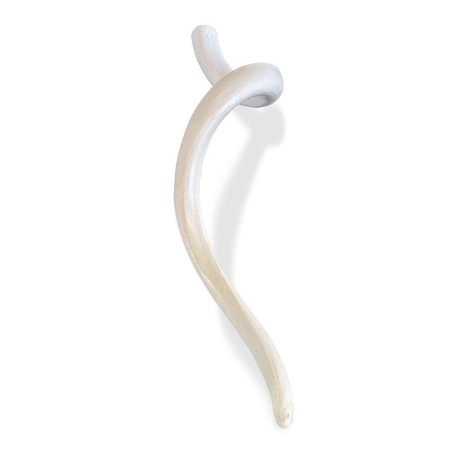 The Vintage Decorative Kudu Horn is a striking organic form that brings natural elegance and sculptural movement into any...