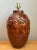 Molded with high-relief wildlife imagery and rich organic texture, this vintage ceramic table lamp features a continuous...