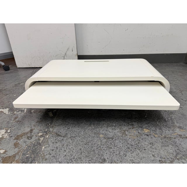 Design Plus Gallery presents a Float Wall Desk from Orange 22. This minimal series was designed by Dario Antonioni to...