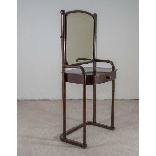 Dressing Table No.1134 by Josef Hoffmann for J&J Kohn is in excellent restored condition with a rich dark mahogany stain....