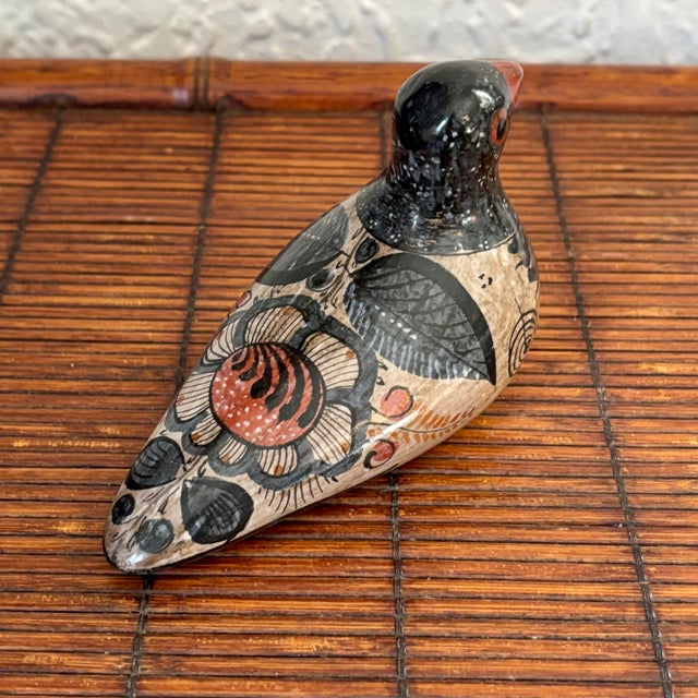 Charming Mexican dove figure from the renowned Tonala region, known for their recognizable artistic style and large...