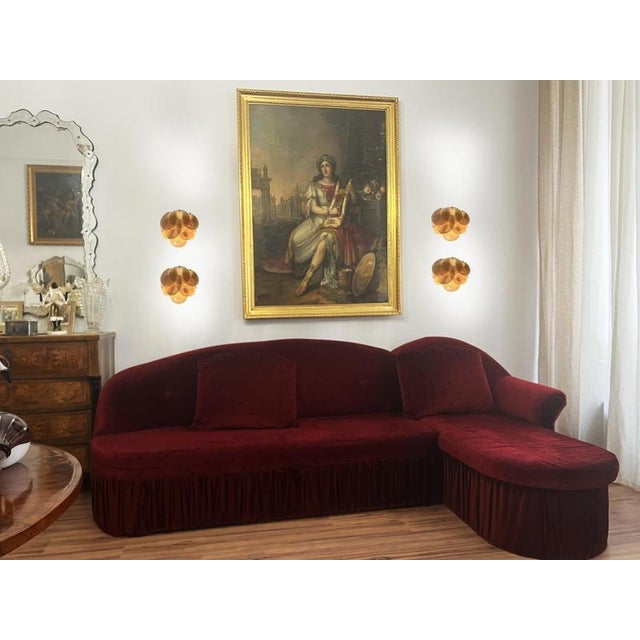 Four Vintage Italian Murano sconces in Vistosi style. Wall lights have 10 alabaster amber glasses for each. Nickel metal...