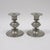 A pair of Scandinavian modern pewter candlesticks designed by Edvin Ollers and produced by Schreuder & Olsson, Sweden....