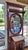 Vintagew apothecary Hallstand. It has an oval mirror that swivels. A handpainted gold border just inside the mirror's...