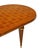 Dining table from mid-century France made of a solid wood construction. The top features a striking Rosewood parquetry...