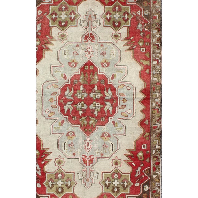 Layered Medallion Vintage Turkish Area Rug Oushak With Geometric Motifs For Sale - Image 4 of 8