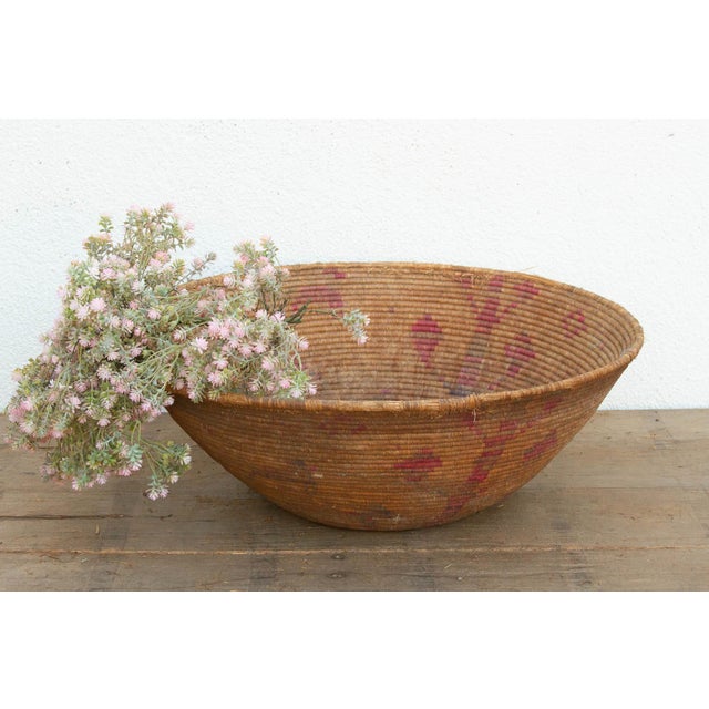 At a substantial 28 inches across, this monumental nomadic gathering vessel is a breathtaking example of wabi-sabi beauty...