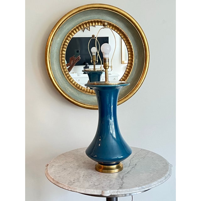 Standing at an impressive 34 inches tall (Grand / XL scale), this lamp features a striking, architectural hourglass/flared...