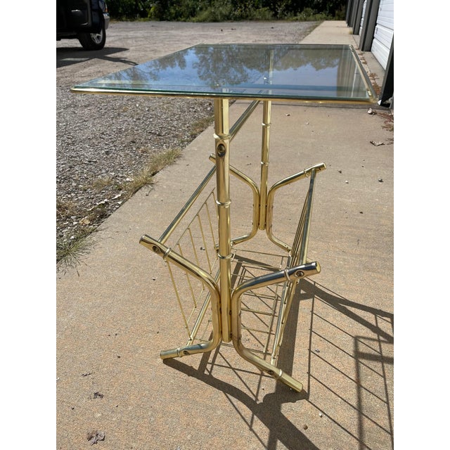 Fabulous vintage accent / side / end / cocktail table with a faux bamboo gold frame and glass insert. Unique and chic...