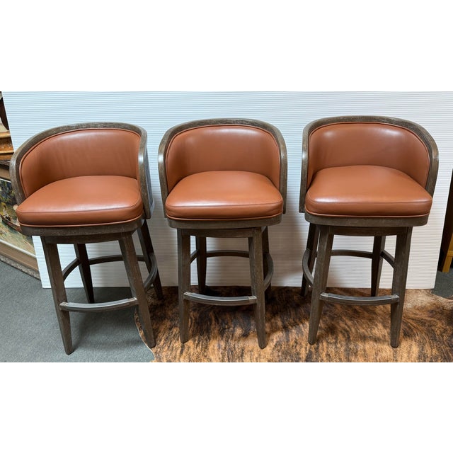 Design Plus Gallery presents a Set of Three Sullivan Bar Stools from Palecek. The set are exquisite pieces of furniture...