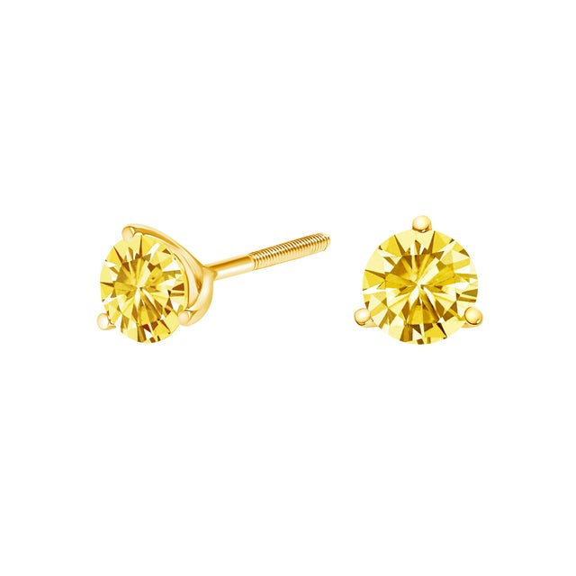 Delicately crafted for the discerning eye, these exquisite stud earrings feature a 2.0 carat total weight of vibrant,...