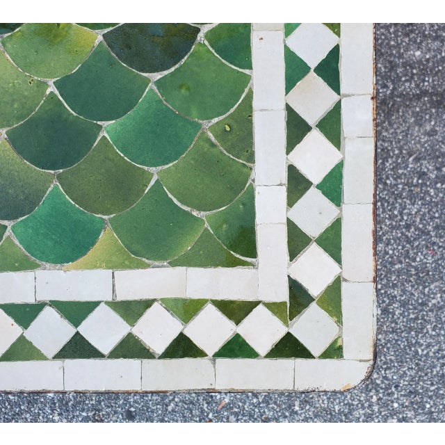 A new arrival. 100 % glazed square. Beautiful tamegrout green and white mosaic tile table. Fish scales design. An indoor /...