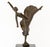 Tanya Poust (American, XX) Dancer Patinated Bronze Sculpture, signed "T. Poust" to circular base, atop a black marble...