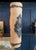 This vintage ceramic vase features a unique rectangular shape with textured beige surface and ornate blue floral accents...