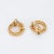 Stylish sapphire & diamond circle stud earrings crafted in 18k yellow gold (circa 1990s). Round brilliant total an...