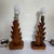 A pair of vintage 1930’s Hawaiian table lamps. The lamps are in a hand carved wood depicting pineapple leaves. The lamps...