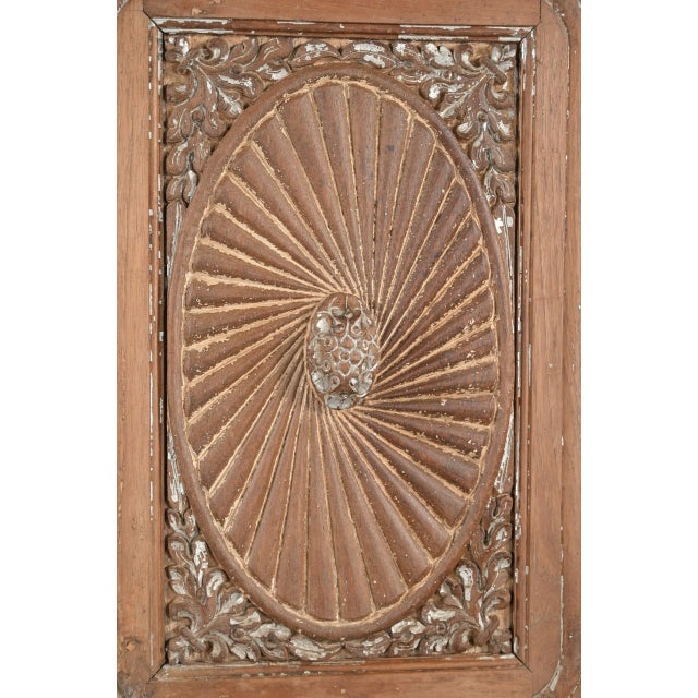 Antique Anglo/Indian Carved Teakwood Armoire, in natural teak with traces of itsw old white paint decoration. This...