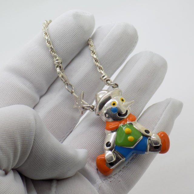 Sweet and charming vintage jewelry full of true Italian identity: a children’s bracelet featuring a large enameled...