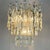Amazing original vintage kalmar chandelier with thick textured glass pendants — each one resembles elongated icicles....