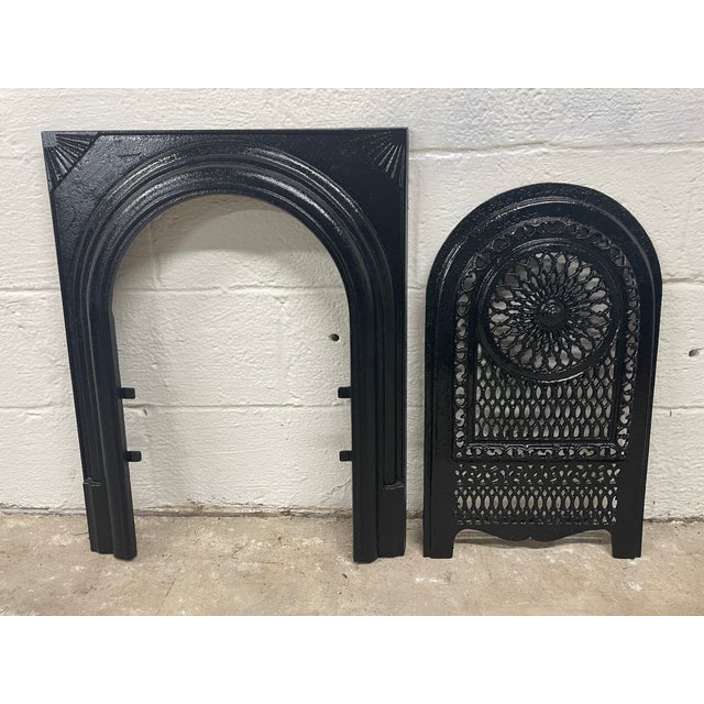Beautiful design fireplace wagon wheel insert and surround and intricate fretwork. Add timeless charm to your home with...