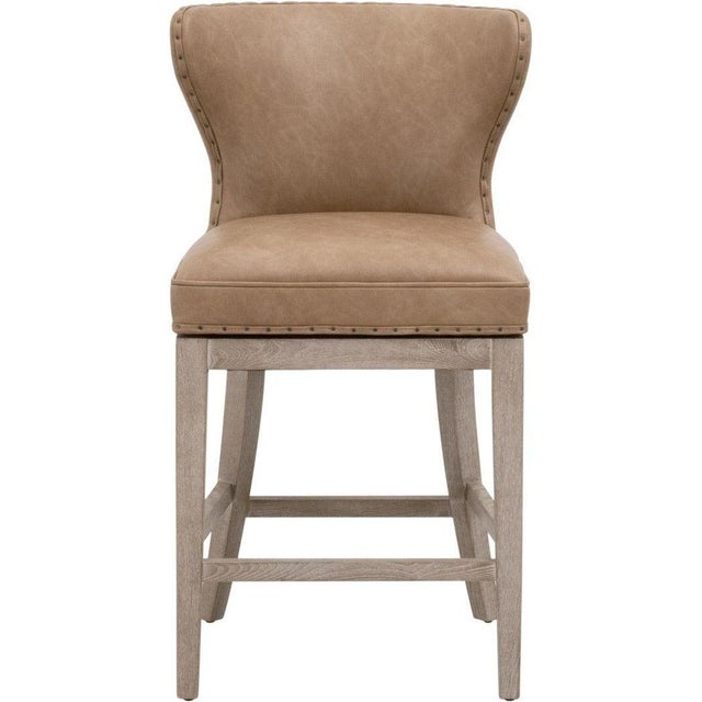 The Milton Swivel Counter Stool by Essentials For Living is designed to add a touch of elegance to any room. With its warm...