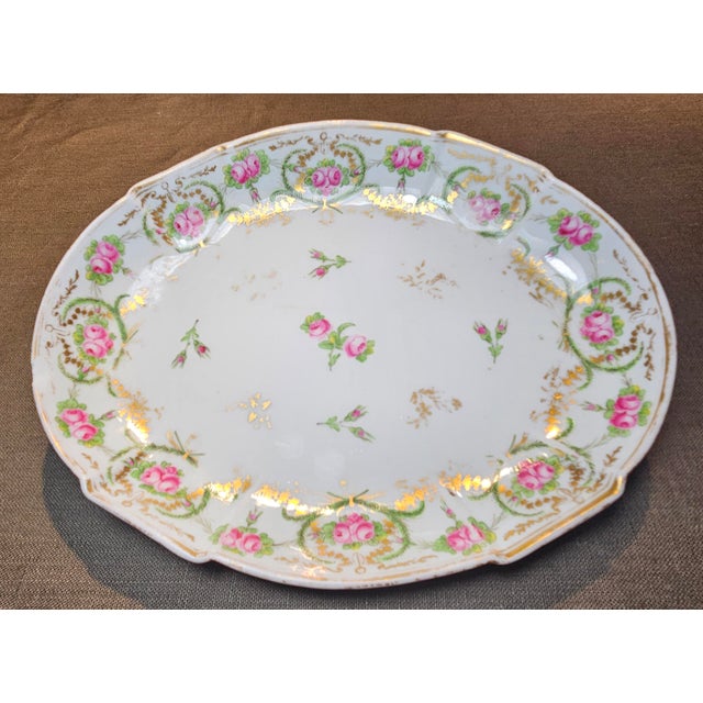 This matched pair of NAST Old Paris porcelain oval serving dishes showcases delicate cornflowers, hand-painted green trim,...