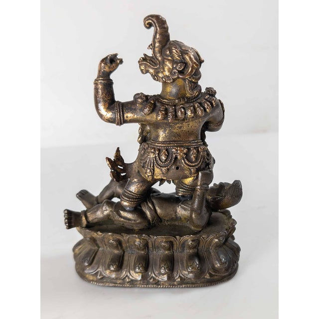 17th or 18th Century Chinese Sino-Tibetan Gilt Bronze Buddhist Makala Faced Deity Figure For Sale - Image 9 of 18