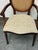 Design Plus Gallery presents a Traditional Oval Cane-Back Armchair from The Bombay Company. The chair is constructed with...