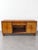 An icon of timeless elegance from the 1930s and 1940s This refined sideboard perfectly embodies the aesthetic canons of...