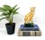Adorable vintage ceramic cheetah with a warm crackle glaze, hand-painted black spots, expressive amber eyes, and a deep...