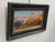 Oil painting on board in wooden frame by Allen Brockbank. Depicts a beautiful sunset landscape. Piece is titled "Sunset...