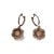 Stylish 14K Two-Tone Gold Diamond Huggie Earrings featuring 30 brilliant round diamonds totaling 0.2 carats . The elegant...