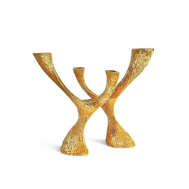 A gorgeous and heavy pair of wishbone-shaped candlesticks in gold plated pewter. Retains original Bergdorf Goodman tag....