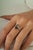 This solitaire ring features a 1.96-carat marquise-cut black diamond set in 14K White Gold. The diamond measuring 6 x 11.5...