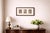 Three dutch historical engravings presented together under a cream mat in a single dark wooden frame. The subjects include...